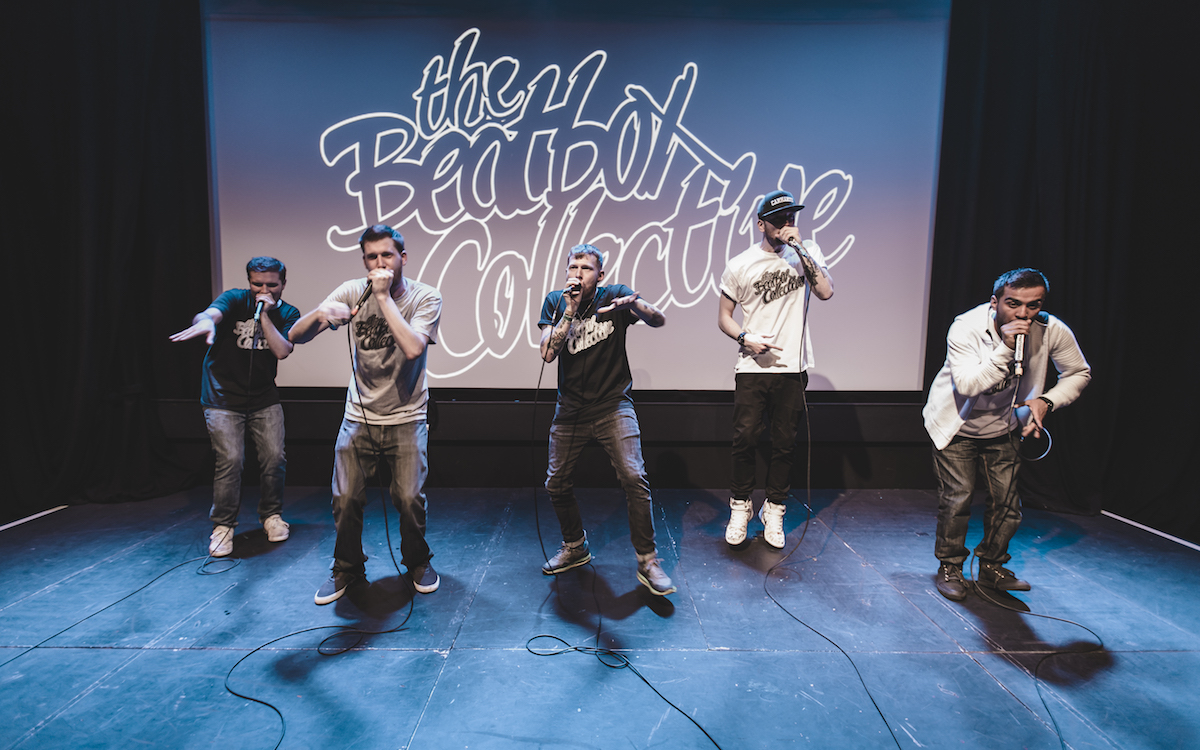 Five beatboxers, the Beatbox Collective, perform onstage